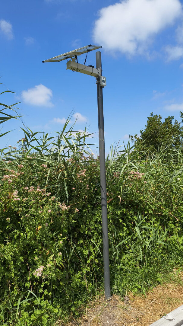 Voorbeeld van een wandelteller langs de weg